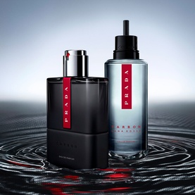 Prada Beauty Luna Rossa Carbon Eau de Parfum 100ml in dark bottle with red cap, shown alongside matching refill bottle