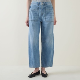 Model wearing Spanx Authentic 360 Lightweight Utility Barrel Leg Jeans in Seaside Blue, wide-leg fit with patch pockets, styled with black ballet