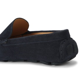 KG by Kurt Geiger blue suede loafer, close-up showing textured strap detail and tan leather lining, rubber sole