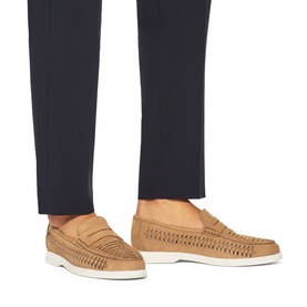 Model wearing KG by Kurt Geiger beige woven suede loafers with white soles, styled with navy tailored trousers.