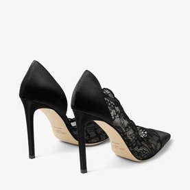 Jimmy Choo black satin and lace pointed-toe stiletto pumps with sheer floral lace panel, slim high heel, and nude insole.