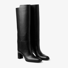 Black leather knee-high boots with structured shaft, square toe, and block heel on white background
