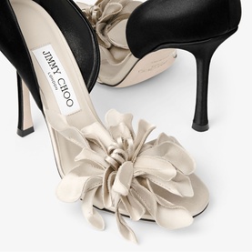 Jimmy Choo white satin heeled mules with oversized floral ruffle embellishment at toe, black contrast back detail, stiletto heel