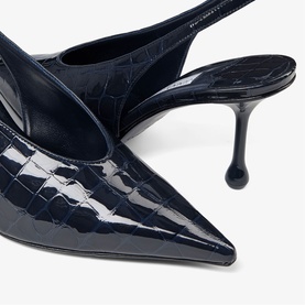 Jimmy Choo blue croc-embossed patent leather pointed-toe slingback heels with sculpted kitten heel, close-up detail shot.