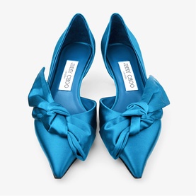 Jimmy Choo blue satin pointed-toe flats with oversized knot bow detail, top-down view showing both shoes