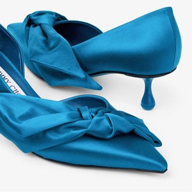 Jimmy Choo blue satin pointed-toe kitten heel mules with oversized bow detail at toe, slim curved heel.