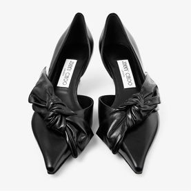 Jimmy Choo black leather pointed-toe d'Orsay heels with oversized knotted bow detail, flat overhead shot.