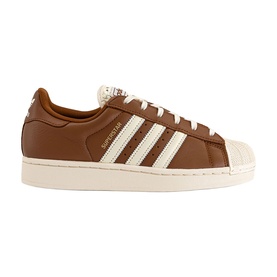 Adidas Superstar trainer in dusky bronze leather with cream white three stripes, shell toe, and off-white cupsole