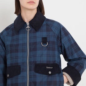 Model wearing Barbour Baiton Check Print Jacket in Weathered Marine, showing corduroy collar, D-ring zip, and snap-button flap pockets.