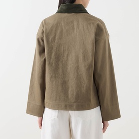Model wearing Barbour Cloverdale Logo Jacket in Dusky Green, rear view, showing contrasting corduroy collar, dropped shoulders and straight hem,