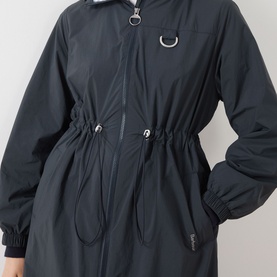 Model wearing Barbour Gracefield Showerproof Jacket in Dark Navy, showing D-ring detail, front zip, drawcord waist and angled welt pockets.