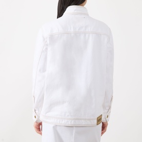 Model wearing Barbour International Kyla Biker Denim Jacket in Denim White, back view showing contrast stitching and logo badge detail.