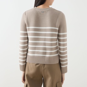 Model wearing Barbour Hinton Striped Knitted Sweater in Light Sand Stripe, showing back view with ribbed trims and cropped length, styled with khaki