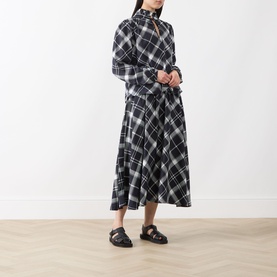Model wearing Barbour Bailton Tartan Blouse in Dark Navy/White Check with matching tartan midi skirt and black strappy sandals