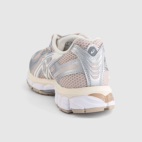 ASICS trainer in blush pink and silver mesh with metallic overlays, cushioned midsole, rear three-quarter view