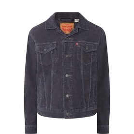 Levi's The Corduroy Trucker Jacket in black, point collar, front button fastening, two chest flap pockets, corduroy finish