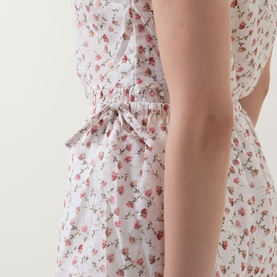 Posse Watercolour Floral cotton shorts with elasticated waist and tie detail, featuring delicate pink floral print on white fabric.