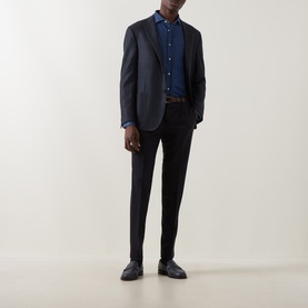 Model wearing B Cucinelli Dark Wash Denim casual shirt, styled with navy blazer, black trousers and dark leather shoes.