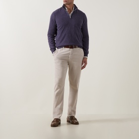 Model wearing B Cucinelli Violet Cashmere Half Zip, styled with stone chinos, brown leather belt and loafers.