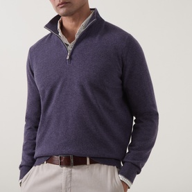 Model wearing B Cucinelli Violet Cashmere Half Zip jumper, styled with a striped shirt collar and beige trousers
