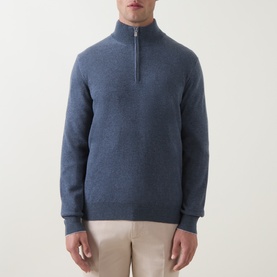 Model wearing B Cucinelli Blue Cashmere Half Zip jumper with ribbed cuffs and hem, styled with beige trousers