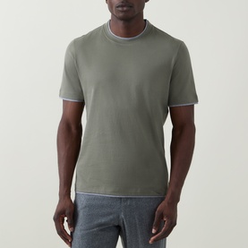 Model wearing B Cucinelli Contrast Trim Jersey T-Shirt in dark green with grey contrast trim at neck and cuffs, styled with grey trousers