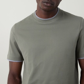 Model wearing B Cucinelli Contrast Trim Jersey T-Shirt in dark green with grey contrast ribbed crew neckline, short sleeves, cotton.