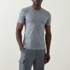 Model wearing B Cucinelli Solid Regular Fit T-Shirt in mid grey, round neck, short sleeves, styled with grey cargo trousers.