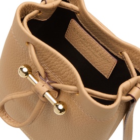 Strathberry caramel leather crossbody bag, interior view showing black lining, drawstring closure with gold-tone hardware detail