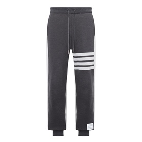 Thom Browne 4-Bar Colourblock Sweat Pants in dark grey cotton with white 4-bar stripe detail, elasticated drawstring waist and cuffed hem.