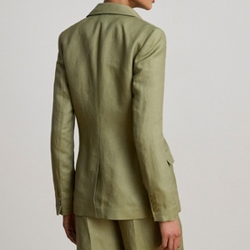 Model wearing Lauren Light Agave linen blazer, rear view, styled with matching trousers