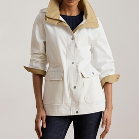 Model wearing Lauren Mascarpone Cream utility jacket with tan collar and cuffs, styled with dark denim jeans