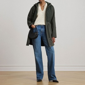 Model wearing Lauren coat in Litchfield Loden, styled with cream knit, blue wide-leg jeans and black crossbody bag.