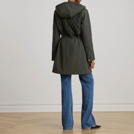 Model wearing Lauren coat in Litchfield Loden, back view, quilted hood, belted waist, styled with blue flared jeans.