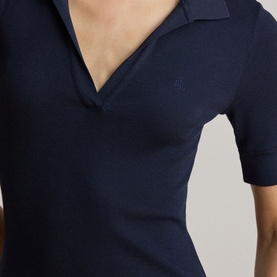 Model wearing Lauren Navy dress with open V-neck polo collar and short sleeves, small embroidered logo at chest