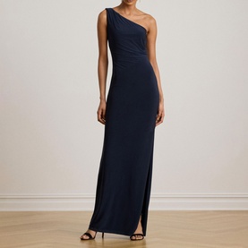 Model wearing Lauren navy one-shoulder maxi dress with ruched bodice and front split, styled with black heeled sandals