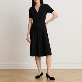 Model wearing Lauren black short-sleeve polo-neck midi dress with pleated skirt, styled with black pointed-toe flats