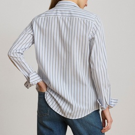 Model wearing Lauren blue multi stripe shirt, back view, long sleeves with cuffs, styled with blue jeans