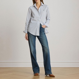 Model wearing Lauren Blue Multi striped shirt with blue bootcut jeans and tan heeled mules
