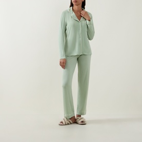 Model wearing Stripe & Stare Classic Scallop Trim Pyjama Set in Eucalyptus Pastels, long-sleeve top with notched lapels and straight-leg trousers