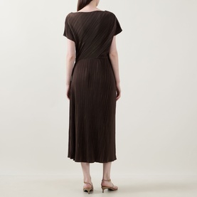 Model wearing Vince Diagonal Pleated Twist Dress in brown, showing back view with pleated midi skirt, cap sleeves and twist waist detail.