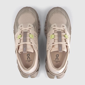 On Running trainers in sand and desert tones, mesh upper with lime green lace toggle detail, overhead flat lay view