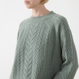 Model wearing Elena Miro flint cable-knit wool crew-neck jumper with raglan sleeves and textured stitch detail.
