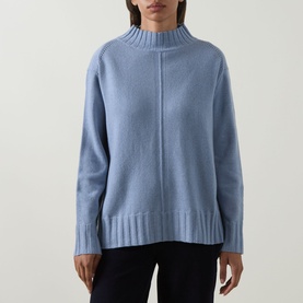 Model wearing Elena Miro Brushed Knitted Sweater in Frost, featuring high mock neck, dropped shoulders, ribbed trims and relaxed fit.
