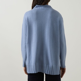 Model wearing Elena Miro Brushed Knitted Sweater in Frost, back view showing high neck, dropped shoulders, and ribbed hem trims.