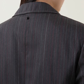 Model wearing HIGH Shimmy Layered Pinstripe Blazer in grey, showing rear notch lapel collar, pinstripe pattern, and rear vent detail.