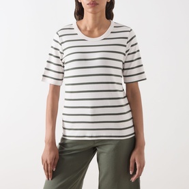 Model wearing Part Two Beetle Stripe cotton T-shirt with crew neck and short sleeves, styled with khaki trousers.