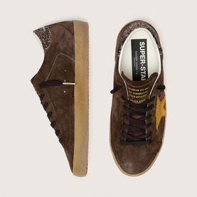Golden Goose Super-Star brown suede trainers with amber star, glitter heel tab, brown laces and gum sole, top and side view