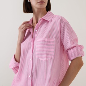 Model wearing Seafolly Light Pop Pink striped cotton cover-up shirt with chest pocket and rolled sleeves, relaxed fit
