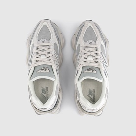 New Balance 9060 trainers in Lone Star Grey, overhead flat lay showing mesh and suede upper with silver reflective overlays and chunky sole